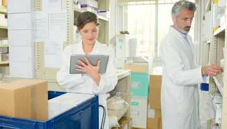 two pharmacist doing inventory