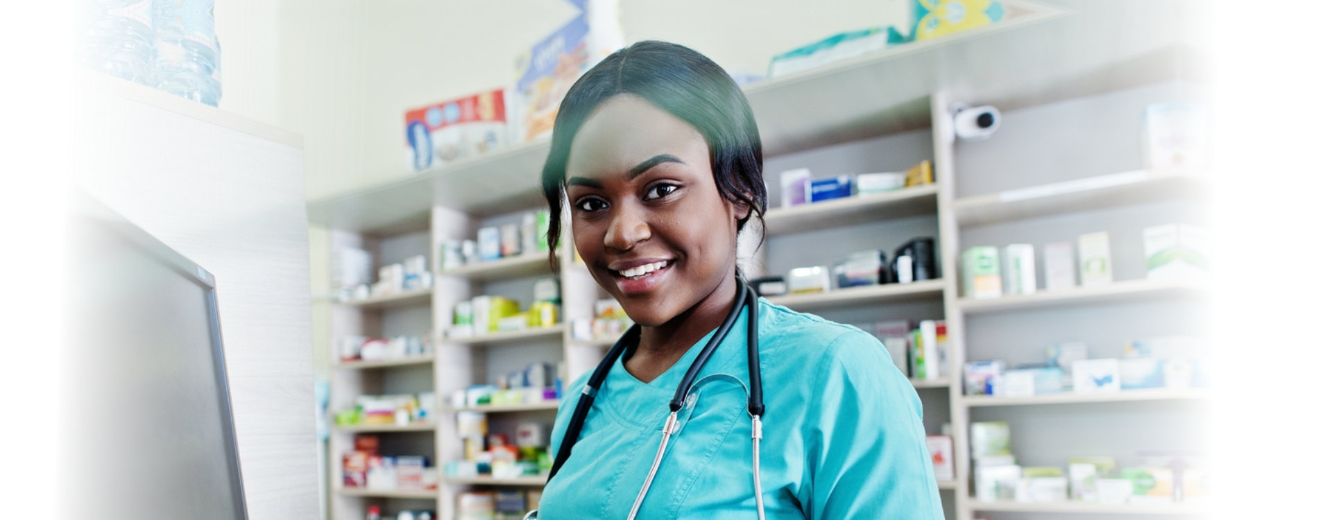 female pharmacist in her station