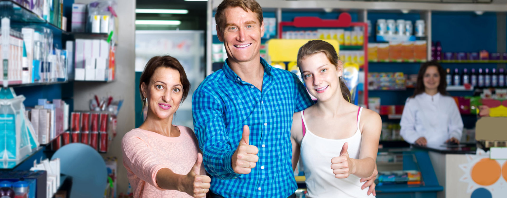 portrait of happy parents with daughter teenager looking satisfied in drug store